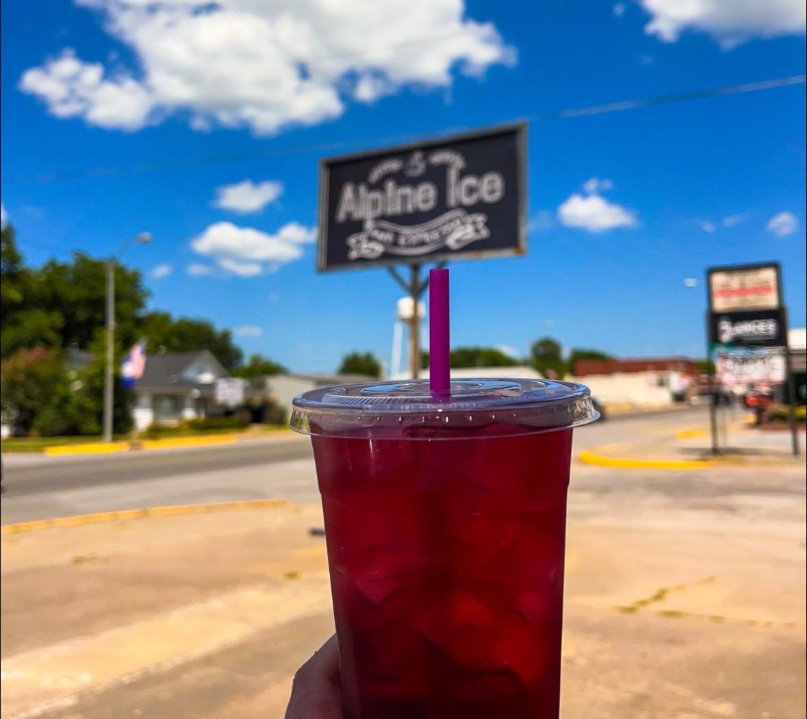 Iced drink with Alpine Ice sign