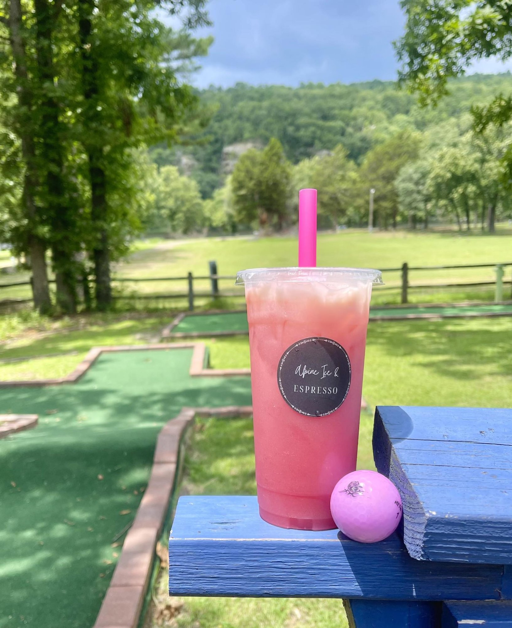 Pink iced drink at mini golf course